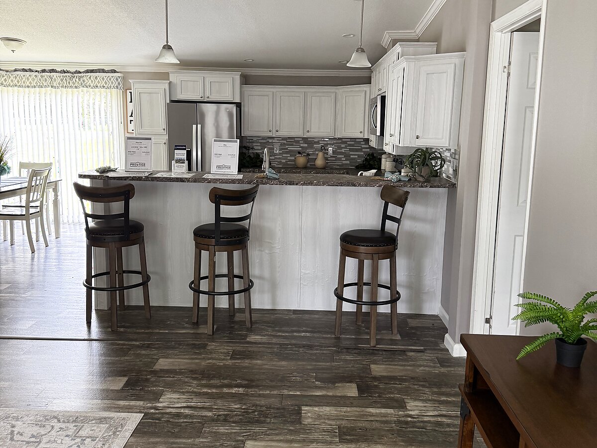The Julia Plus model home kitchen at Majestic Homes Florida